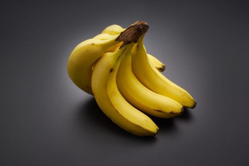graphicstock bananas on the black background Sdyg9 2vesg Can German Shepherds Eat Bananas?