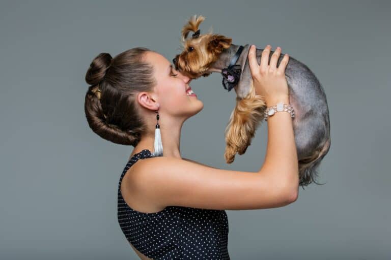 Girl with yorkie dog